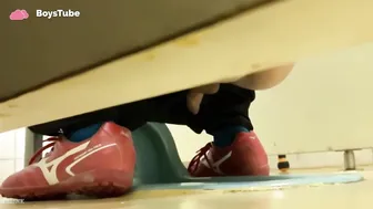 Athlete shitting in squat toilet