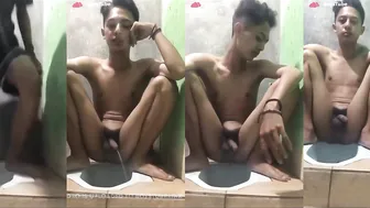 Asian guy takes a smoke break poop