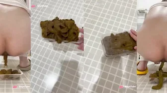 Chinese master shitting into a plastic box