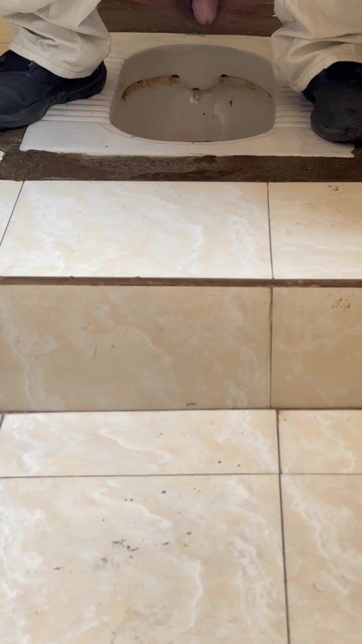 Chinese doorless squat toilet w/ shitting 3