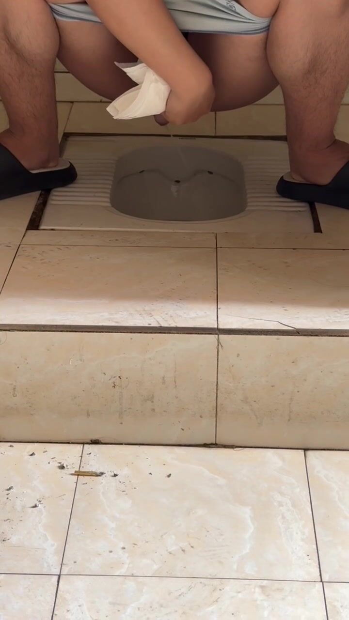 Chinese doorless squat toilet w/ pooping 2