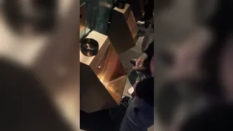 A male is pissing in the toilet. 3