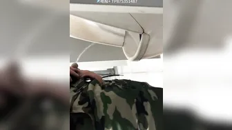 A male is pissing in the toilet. 11