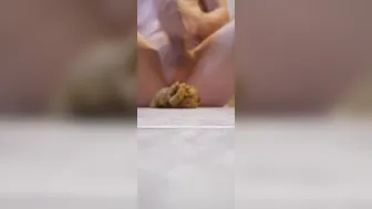 sittng & shitting on the bathroom floor
