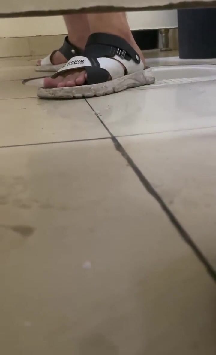 Chinese guy wanking in squat toilet