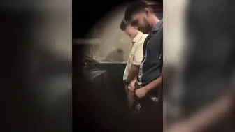 Males  are pissing in the toilet.