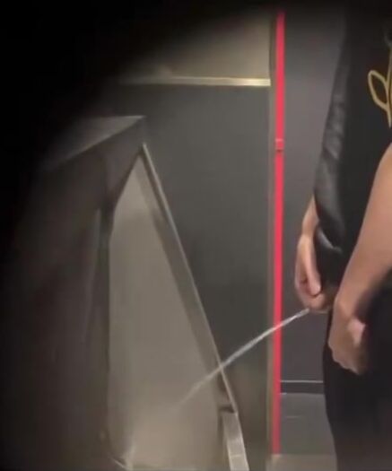 Males  are pissing in the toilet. 3