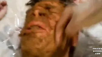 Feeder takes a shit on sub's face abd smear it