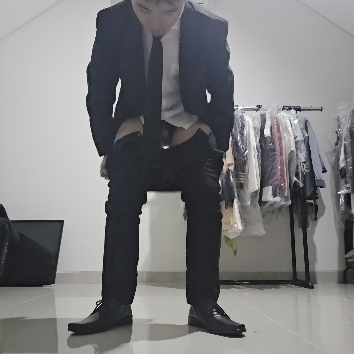 Suit guy shitting (face)