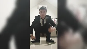Business guy shitting (face)
