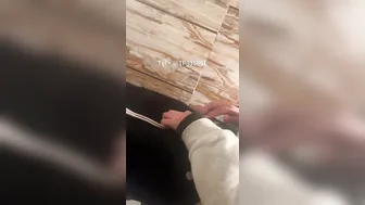A male is pissing in the toilet. 17