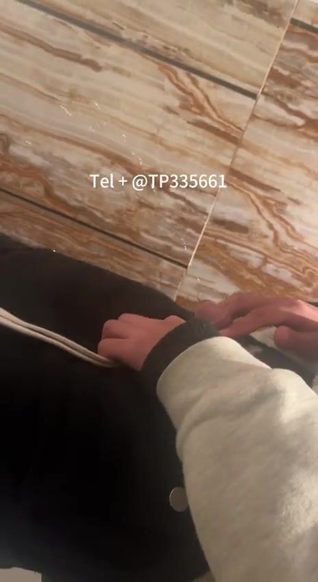 A male is pissing in the toilet. 17