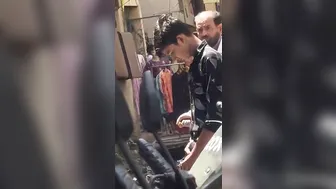 A male is pissing outside.