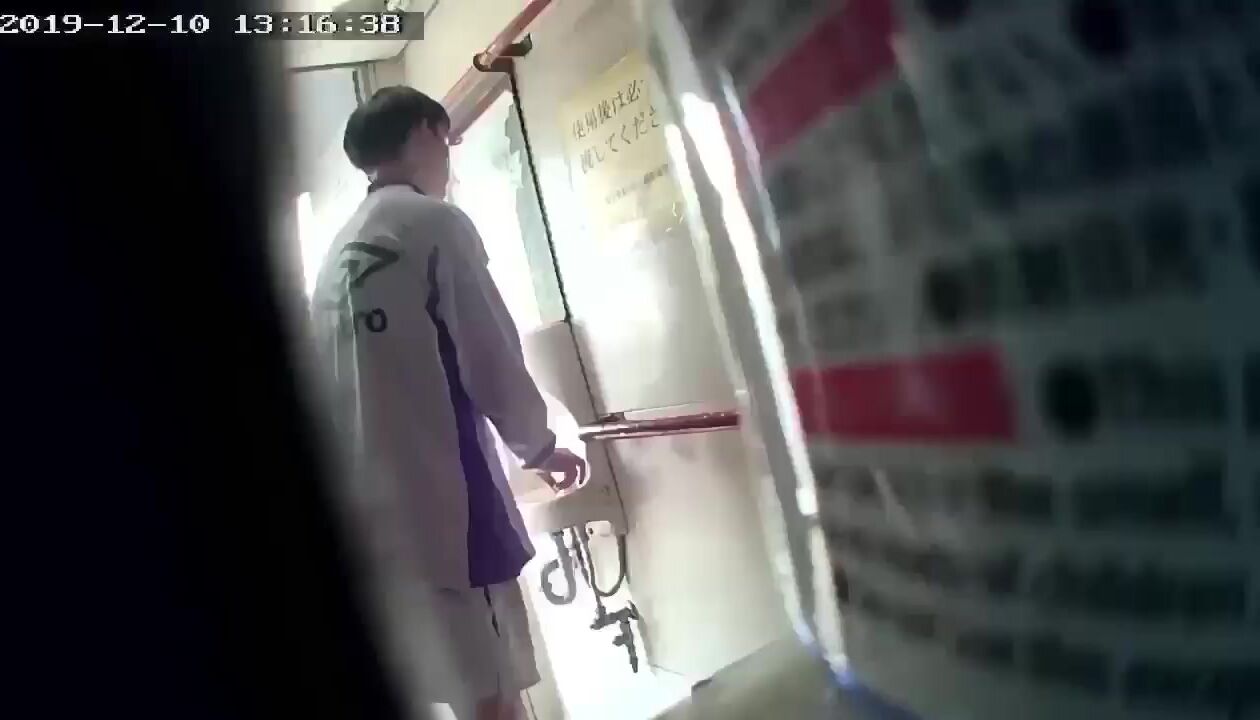 A male is pissing in the toilet. 21