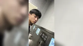 A male is pissing in the toilet. 22
