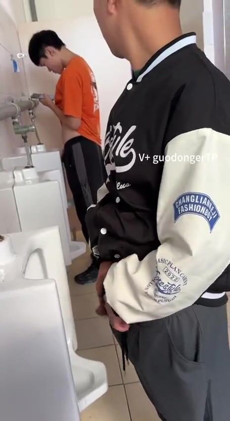 Males are pissing in the toilet. 3