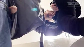 Cute blond guy feeds his veiny dick to a cock-hungry dude at a public toilet