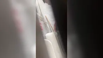 A male is pissing in the toilet. 25